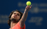 Spain's Carlos Alcaraz serves to compatriot Jaume Munar in their men's singles semi-final tennis match at the ATP Tour Japan Open Tennis Championships at the Ariake Tennis Forest Park in Tokyo on October 5, 2026. (Photo by Rie KIKUCHI / AFP)