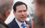 :US Secretary of State Marco Rubio speaks to the press before boarding a plane en route to Iceland at Joint Base Andrews, Maryland, on October 5, 2026. Photo by Mark Schiefelbein / POOL / AFP
