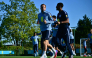 Harry Kane (left) and teammates take part in a team training session yesterday. 