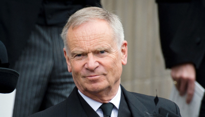 (Files) British author and former MP Jeffrey Archer leaves St Paul's Cathedral at the end of British former prime minister Margaret Thatchers ceremonial funeral in central London on April 17, 2013. (Photo by Leon Neal / AFP)