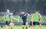 Al Shamal players in action during a training session.