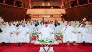 Minister of Awqaf and Islamic Affairs H E Ghanem bin Shaheen bin Ghanem Al Ghanim with other officials during an honouring ceremony.