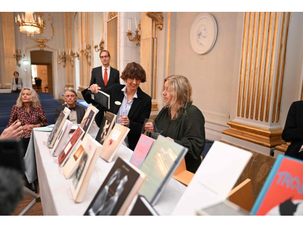 Copies of books by Canadian author Anne Carson are on display at the Swedish Academy in Stockholm, Sweden, after a press conference on October 8, 2026 to announce her as the winner of the 2026 Nobel Prize in Literature. (Photo by Jonathan Nackstrand / AFP)