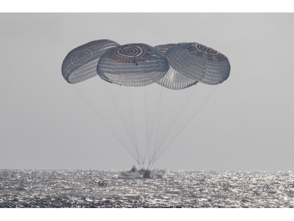 This picture provided by NASA shows the SpaceX Crew Dragon Freedom spacecraft as it lands with NASA astronauts Jessica Meir, Jack Hathaway, ESA (European Space Agency) astronaut Sophie Adenot, and Roscosmos cosmonaut Andrey Fedyaev aboard in the Pacific Ocean off the coast of Los Angeles, California, on October 8, 2026. Photo by Keegan Barber / NASA / AFP