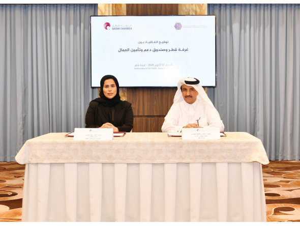 QC Board Member Dr. Khalid bin Klefeekh Al Hajri, and on behalf of the Workers’ Support and Insurance Fund Executive Director Kholoud Saif Al Kubaisi during the signing of the agreement. 
