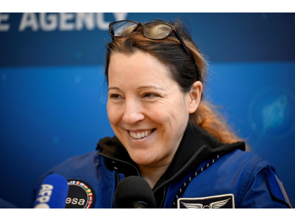 European Space Agency (ESA) French astronaut Sophie Adenot reacts as she delivers a speech following her arrival at the Military Airport in Cologne on October 10, 2026. (Photo by Ina Fassbender / AFP)