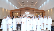 Officials from Zakat Affairs Department with the school students during the awareness visit.