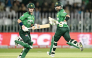 Pakistan’s captain Sahibzada Farhan (right) and Maaz Sadaqat run between the wickets during the second T20I.
