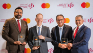 Group CEO of Commercial Bank Stephen Moss with other senior officials with the awards.
