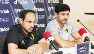 Qatar SC's new coach Rashid Al Kubaisi (left) speaks during a press conference.