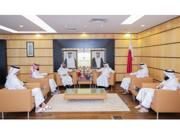 Officials from the two entities during a meeting in Doha