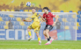 Action during the match between Al Rayyan and Al Taawoun.