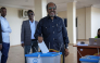 (FILE PHOTO) Somalia's President Hassan Sheikh Mohamud casts his ballot during local council elections in Mogadishu on December 25, 2025. (Photo by Hassan Ali ELMI / AFP)