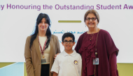 Director of Qatar Academy Msheireb Lina Mouchantaf (right) and another official with Jassim Mohammed Al Mosallam.