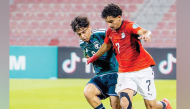 Action during the match between Egypt and Saudi Arabia.