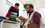 Mahmoud Abou Nusair has his prosthetic attached at a medical centre in Amman on October 13, 2026 as part of the 