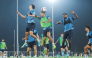 Al Ahli players take part in a training session.