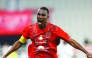 Al Duhail's Almoez Ali celebrates after scoring a goal. 
