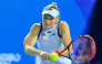 Kazakhstan's Elena Rybakina hits a return to Russia's Diana Shnaider during their women's singles semifinal match on October 24, 2026. (Photo by CN-STR / AFP)