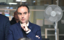 :France's Prime Minister Sebastien Lecornu (C) reacts at a police station during a visit to Limoges in the context of security and reconstruction efforts after a group of individuals forced entry into the building during last weekend's protest action against the 