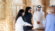 Chairperson of Qatar Museums H E Sheikha Al Mayassa bint Hamad bin Khalifa Al Thani during a tour of the exhibition.
