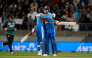 India's Abhishek Sharma (L) hugs teammate Vaibhav Sooryavanshi during the 3rd T20 cricket match between New Zealand and India. (Photo by Marty Melville / AFP)