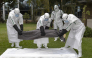 Kenya Red Cross personnel in Personal Protective Equipment (PPE) simulate the evacuation of remains of an Ebola victim in the Kenyan capital Nairobi on October 22, 2026. Photo by TONY KARUMBA / AFP