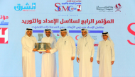 Undersecretary of the MoT H E Mohammed Abdullah Al-Maadeed (center); CEO of Dar Al Sharq Group Abdul Latif Abdullah Al Mahmoud (second right); and Editor-in-Chief of Al Sharq Jaber Salem Al-Harmi (right) with other officials during the 4th Qatar Supply Chain Management Conference yesterday.