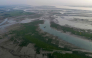 This aerial photograph taken on October 13, 2026, shows wetlands along the Padma river at Ujirpur, near the Bangladesh-India frontier in Bangladesh's Rajshahi division. (Photo by Salahuddin Ahmed / AFP)