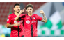 Gabriel Pereira (right) celebrates after scoring Al Rayyan's third goal. 