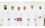 Minister of Awqaf and Islamic Affairs H E Ghanem bin Shaheen bin Ghanem Al Ghanim with officials and honouree during ceremony.