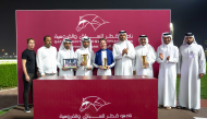 QREC Chairman Hamad bin Abdulrahman Al-Attiyah presented the QA Gr3 Barzan Cup trophy to the connections of Dumonet. PICS: JUHAIM/QREC
