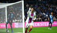 PSG's Moroccan defender #02 Achraf Hakimi celebrates scoring his team's fifth goal during the French L1 football match between Le Havre Athletic Club and Paris Saint-Germain (PSG) at Stade Oceane in Le Havre, north-western France on October 30, 2026. (Photo by Guillaume SALIGOT / AFP)