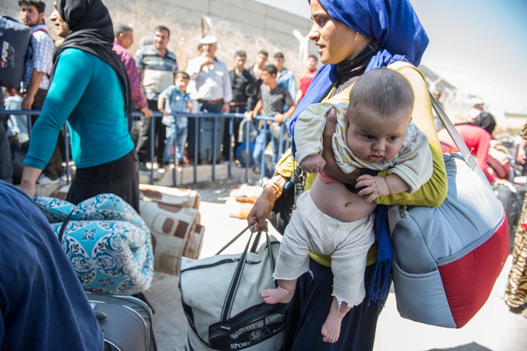 Syrians are seen with their belongings in the Karkamis district of Gaziantep, Turkey on September 09, 2016.  Kerem Kocalar - AA
