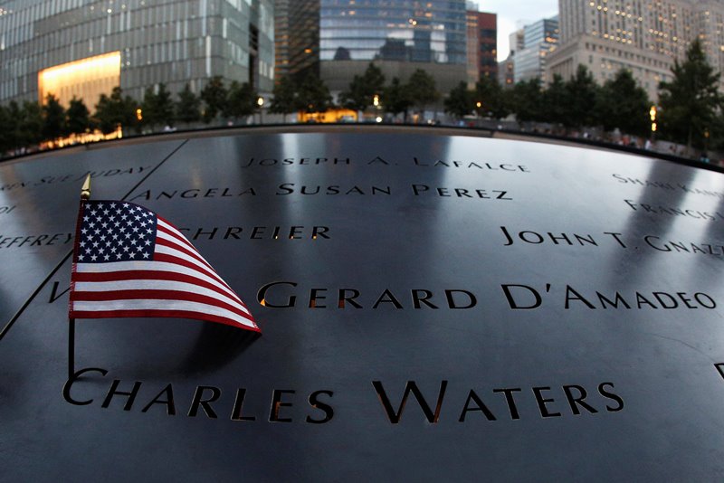 A US flag is placed on a name on the memorial at the National September 11 Memorial and Museum in Lower Manhattan in New York City, US, September 9, 2016. Reuters/Brendan McDermid