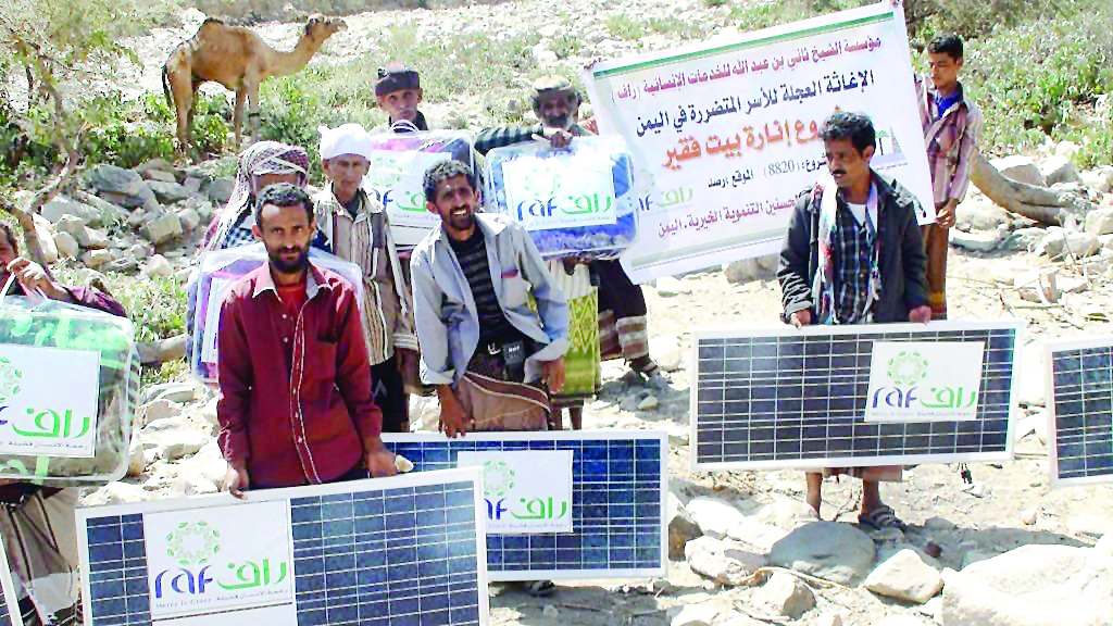 Beneficiaries with solar power systems provided to light up their homes in a village in Yemen.