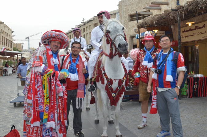 Bayern Munich supporters in Qatar for their team's training camp, visit Doha's Souq Waqif.