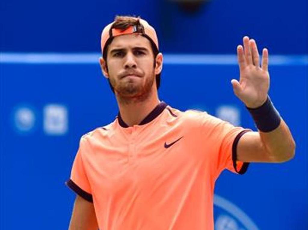 Karen Khachanov of Russia gestures after a point against Feliciano Lopez of Spain during their men's singles quarter-final match at the Chengdu Open ATP tennis tournament in Chengdu, southwest China's Sichuan province on September 30, 2016. China OUT
/ A