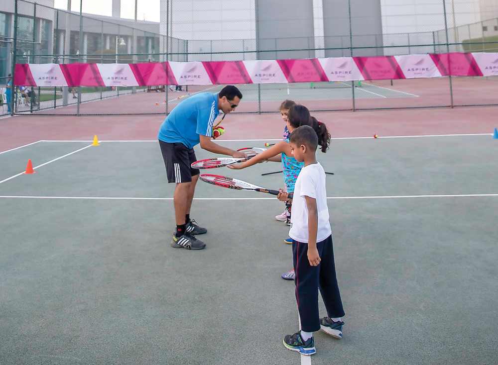Children between the ages of six and nine during a training camp to discover their tennis potential at Aspire Zone on Sunday.