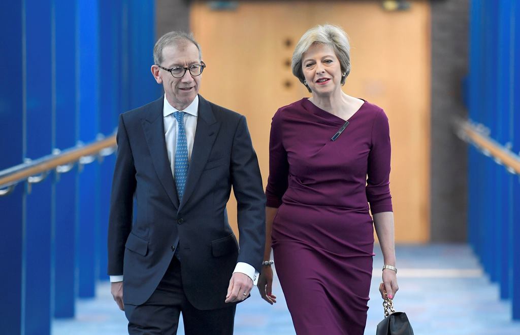 Britain's Prime Minister Theresa May and her husband Philip arrive on the final day of the annual Conservative Party Conference in Birmingham, Britain, October 5, 2016. Reuters/Toby Melville
