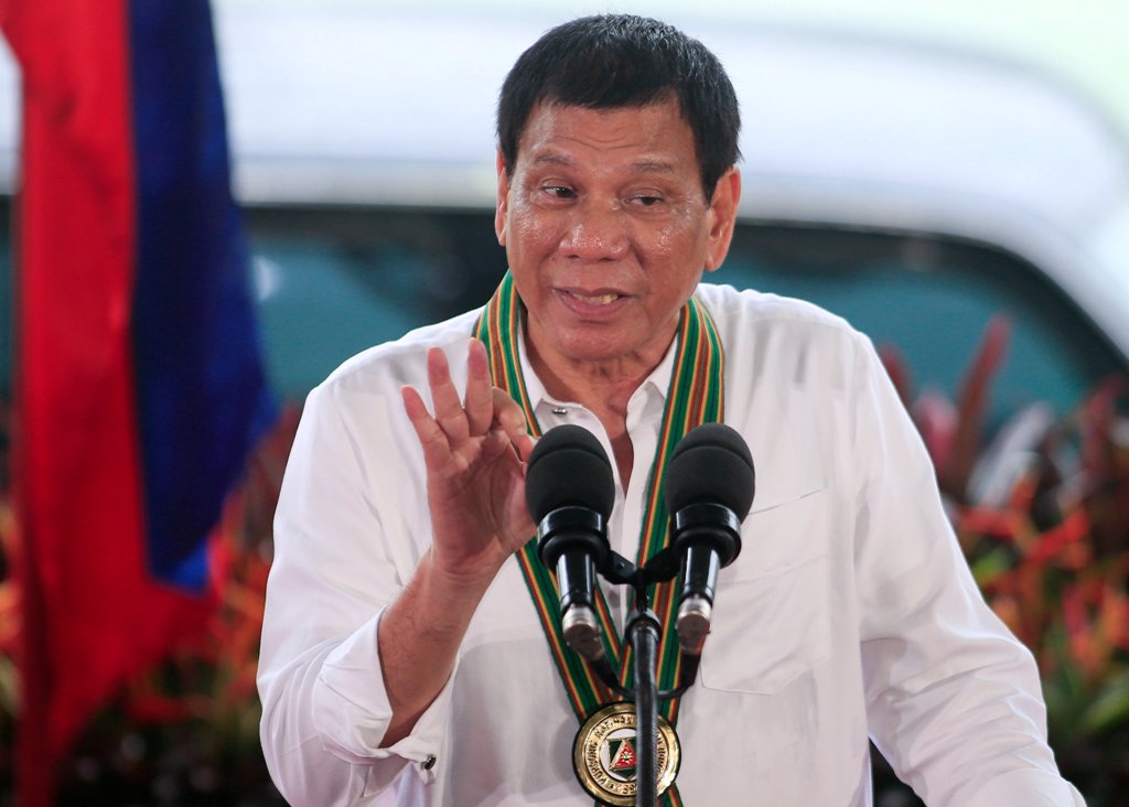 Philippines President Rodrigo Duterte gestures as he delivers a speech to the members of the Philippine Army during a visit at the army headquarters in Taguig city, metro Manila, Philippines October 4, 2016. REUTERS/Romeo Ranoco