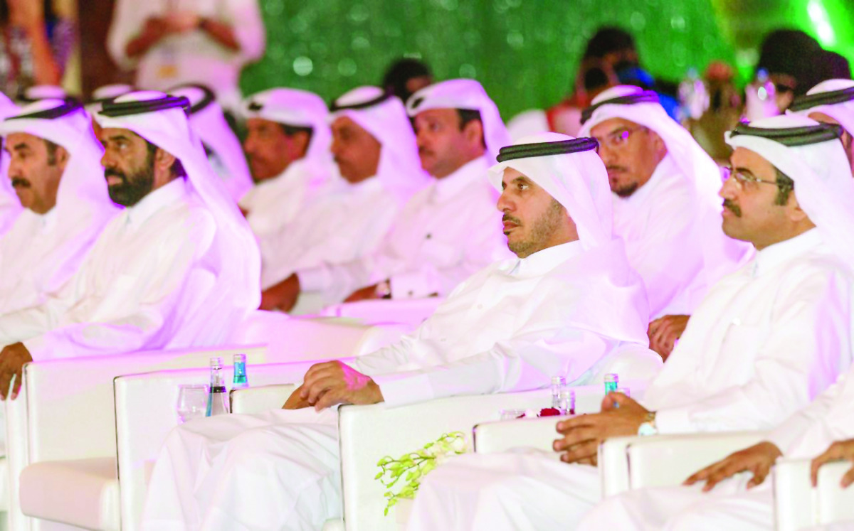 Prime Minister and Interior Minister H E Sheikh Abdullah bin Nasser bin Khalifa Al Thani at Teachers’ Day celebrations in Katara yesterday. 