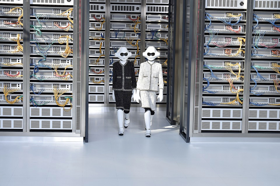 In his work for Chanel's spring clothes, designer Karl Lagerfeld focused on the innards of our computers - the data, the algorithms and microchips - instead of the gleaming exterior. (Olivier Claisse, MCV Photo)