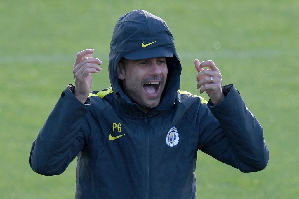 Manchester City's Spanish manager Pep Guardiola attends a team training session at Manchester City Football Academy Campus in Manchester, north west England, on October 18, 2016 ahead of their UEFA Champions League Group C football match against Barcelona