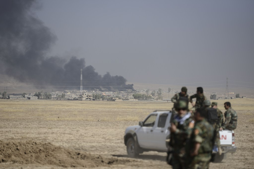 Smoke rises over Tarjala village as Peshmerga forces attack on Deash targets during an operation to liberate Mosul from Islamic State terrorist organization on October 17, 2016.  ( Hamit Hüseyin - Anadolu Agency )
