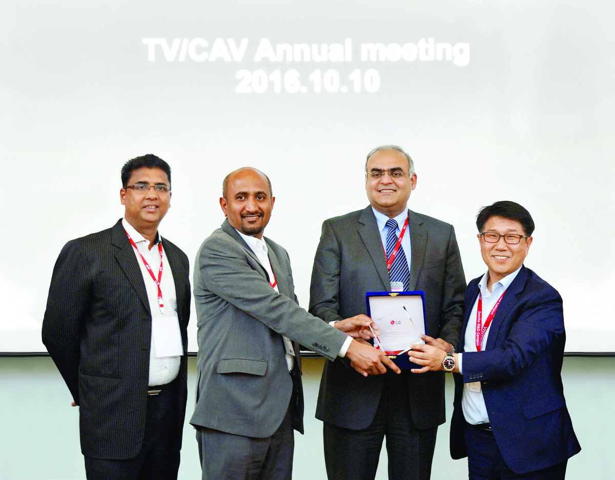 From Left: From Video Home, Rajesh Menon — Divisional Manager, LG TV; Uday Bhagat — AGM Finance; Mohammed Anis — General Manager, receiving the highest Growth in GCC award from YG Choi — LG President Gulf, in South Korea.