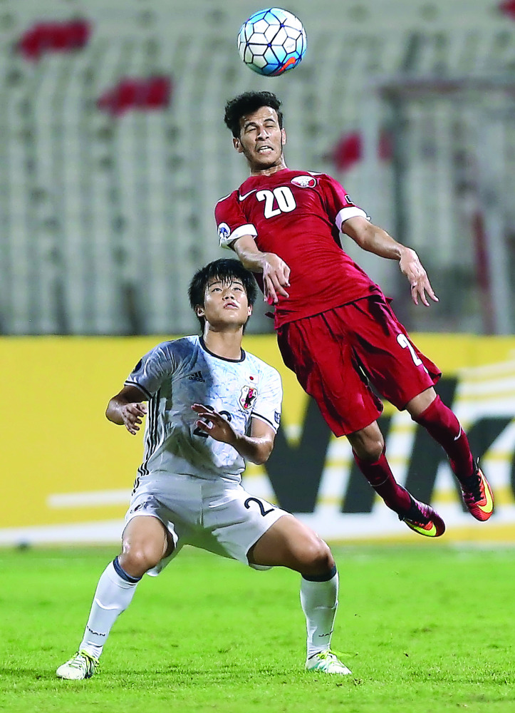 Action from match between Qatar and Japan in Riffa.