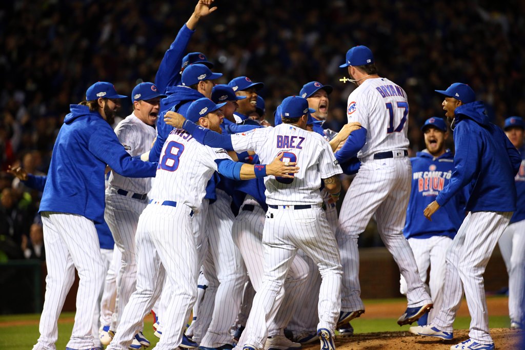  The Chicago Cubs celebrate defeating the Los Angeles Dodgers in game six of the 2016 NLCS playoff baseball series at Wrigley Field. Jerry Lai/USA TODAY Sports