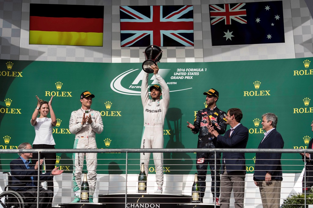 Oct 23, 2016; Austin, TX, USA; Mercedes driver Lewis Hamilton (44) of Great Britain celebrates winning the United States Grand Prix at the Circuit of the Americas. Mandatory Credit: Jerome Miron-USA TODAY Sports

