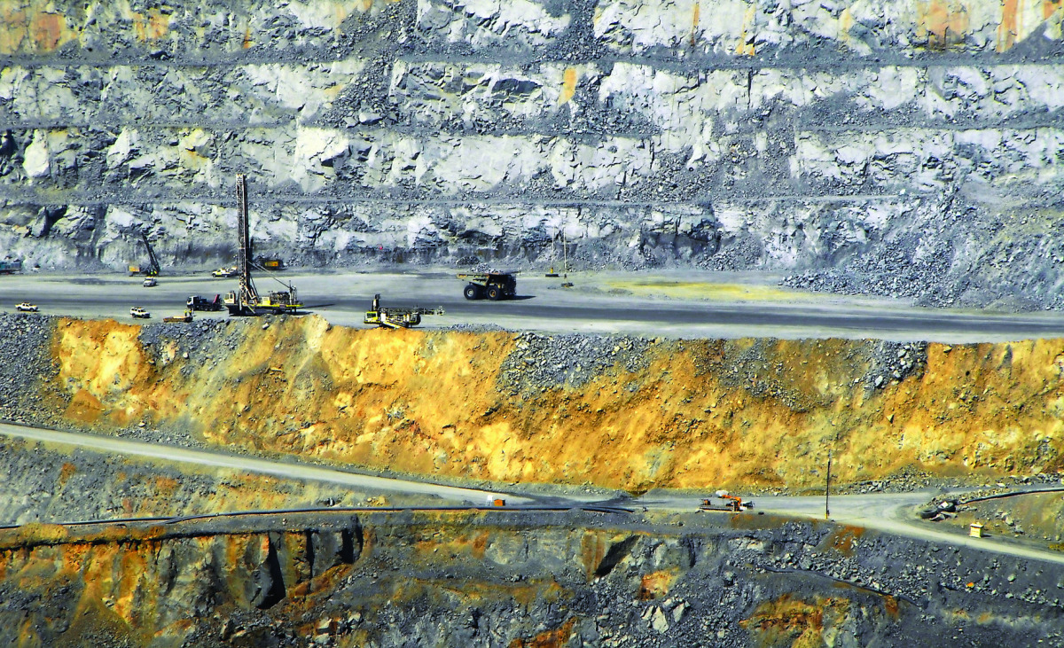 Mining equipment is seen inside the vast open pit of the Batu Hijau copper and gold mine, run by Newmont Mining Corp, on Indonesia’s Sumbawa island. 